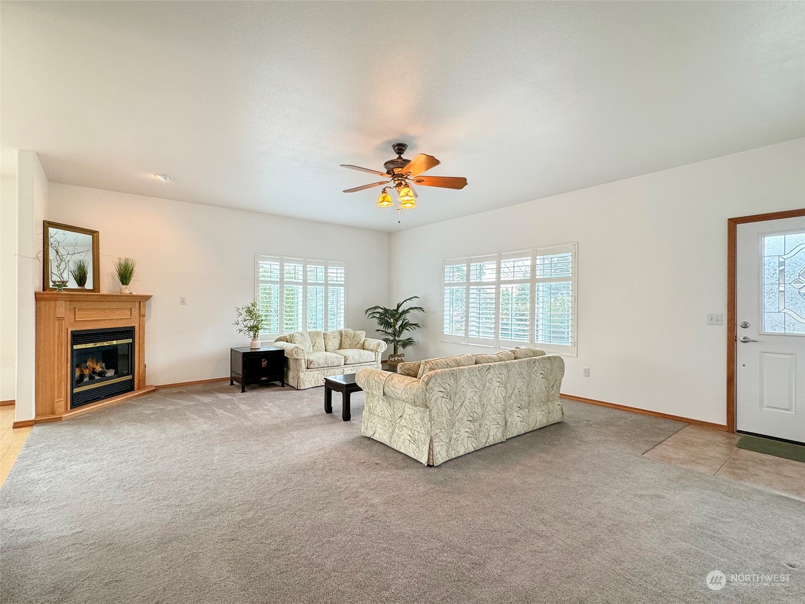 50 Nesting Place Sequim, WA 98382 - Photo 5 of 40 a living room with furniture and a fireplace