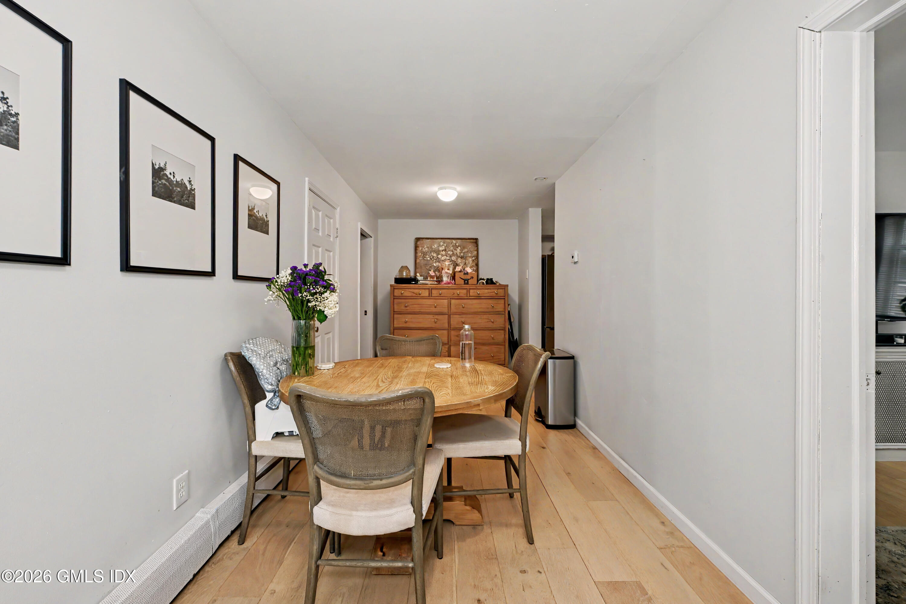 37 Prospect Street Greenwich, CT 06830 - Photo 8 of 41 a view of a dining room with furniture and wooden floor
