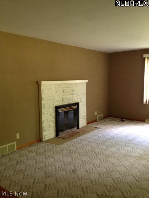 1895 Far View Road Akron, OH 44312 - Photo 16 of 24 Fireplace in living room.