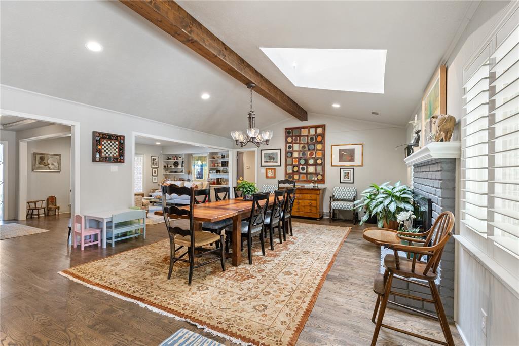7138 Grand Oaks Road Dallas, TX 75230 - Photo 12 of 39 a view of a dining room with furniture