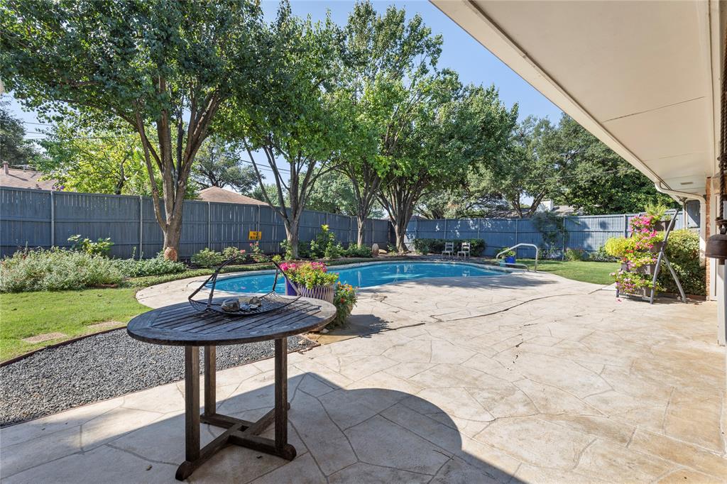 7138 Grand Oaks Road Dallas, TX 75230 - Photo 33 of 39 a view of outdoor space yard deck and patio