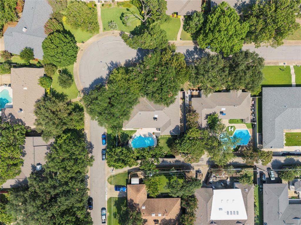 7138 Grand Oaks Road Dallas, TX 75230 - Photo 39 of 39 an aerial view of a house with a yard and garden