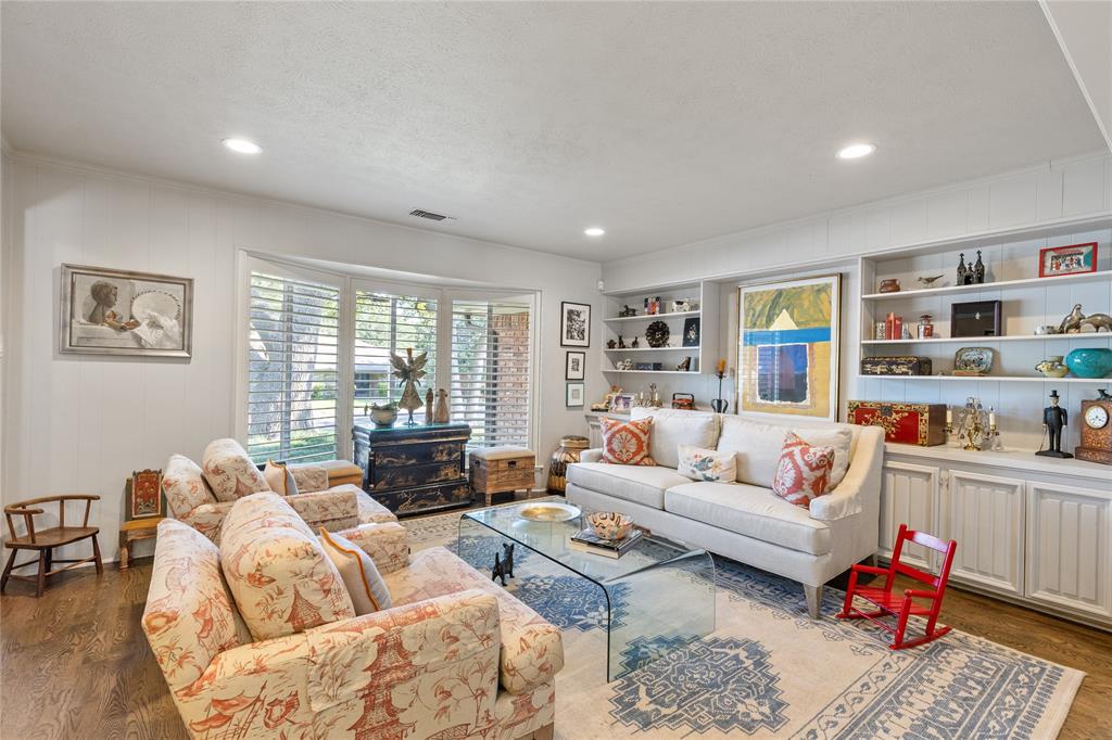 7138 Grand Oaks Road Dallas, TX 75230 - Photo 5 of 39 a living room with furniture and a large window