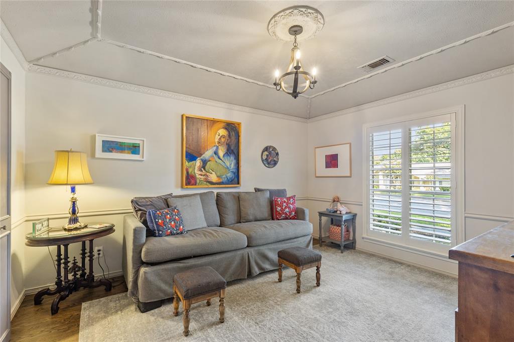 7138 Grand Oaks Road Dallas, TX 75230 - Photo 7 of 39 a living room with furniture and a window