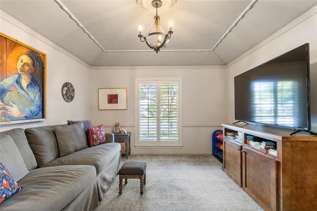7138 Grand Oaks Road Dallas, TX 75230 - Photo 8 of 39 a living room with furniture and a window