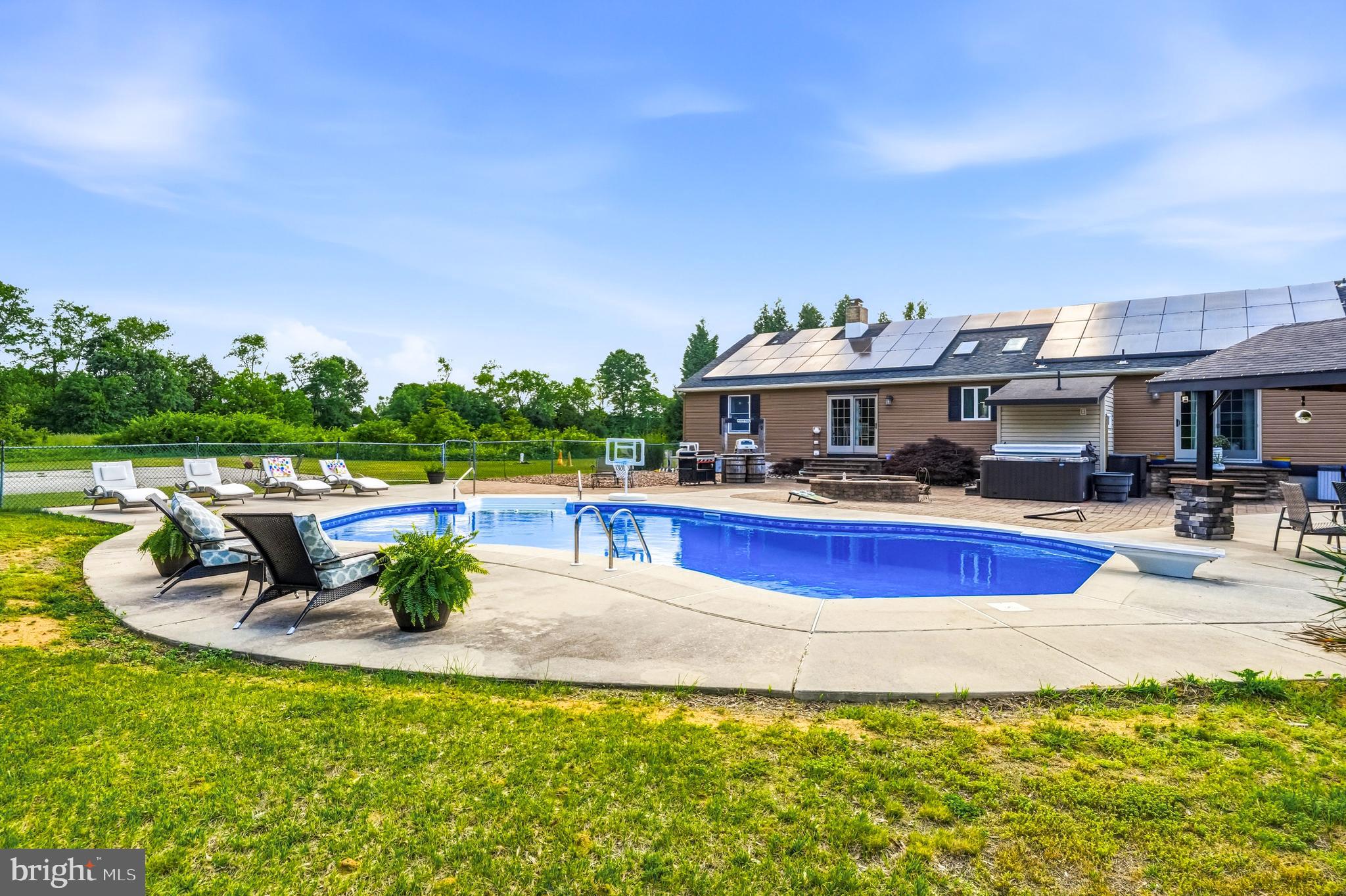 705 Garden Road Pittsgrove, NJ 08318 - Photo 66 of 72 a view of a swimming pool with an outdoor seating