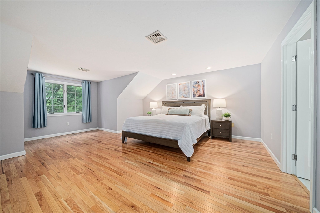 9 Powder Hill Way, Unit 9 Westborough, MA 01581 - Photo 17 of 40 a bedroom with a bed and window