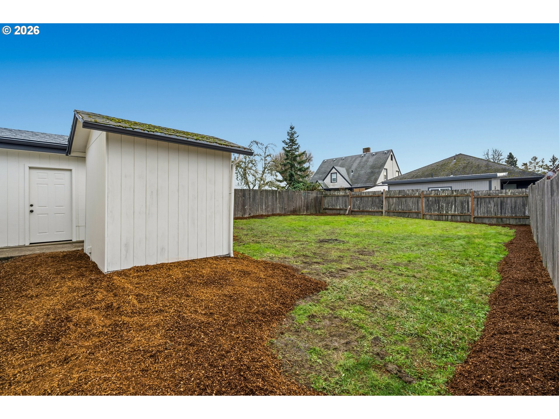 1730 Southwest 12th Avenue Albany, OR 97321 - Photo 12 of 24 a view of a backyard with a garden and plants
