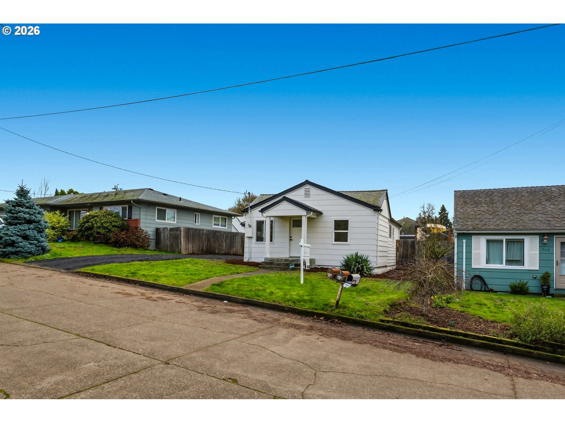 1730 Southwest 12th Avenue Albany, OR 97321 - Photo 16 of 24 a front view of a house with a yard