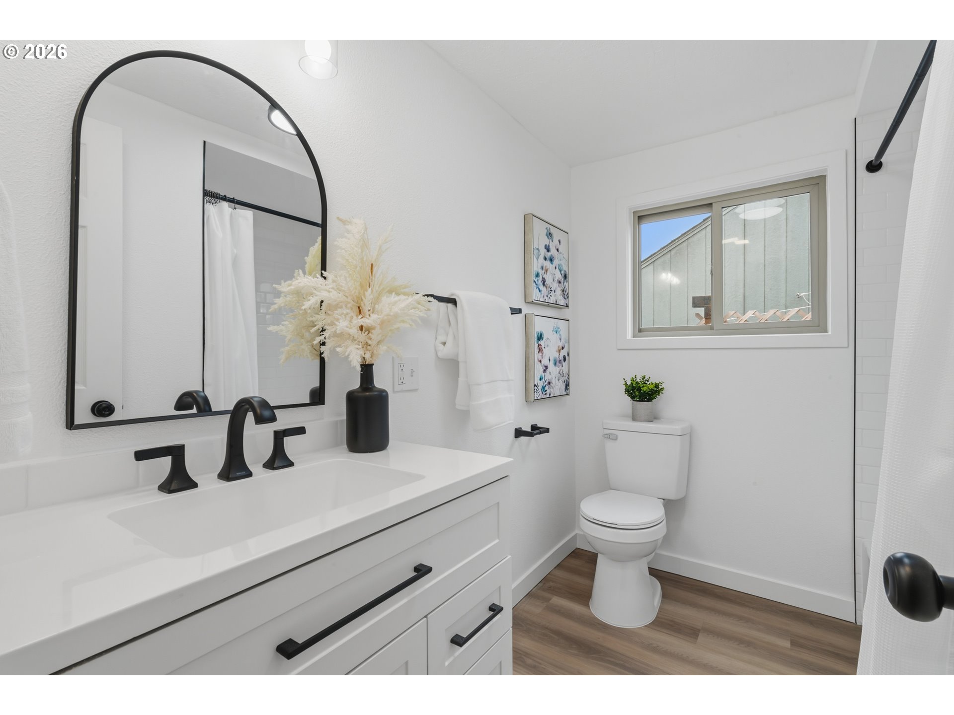 1730 Southwest 12th Avenue Albany, OR 97321 - Photo 8 of 24 a bathroom with a sink and a mirror