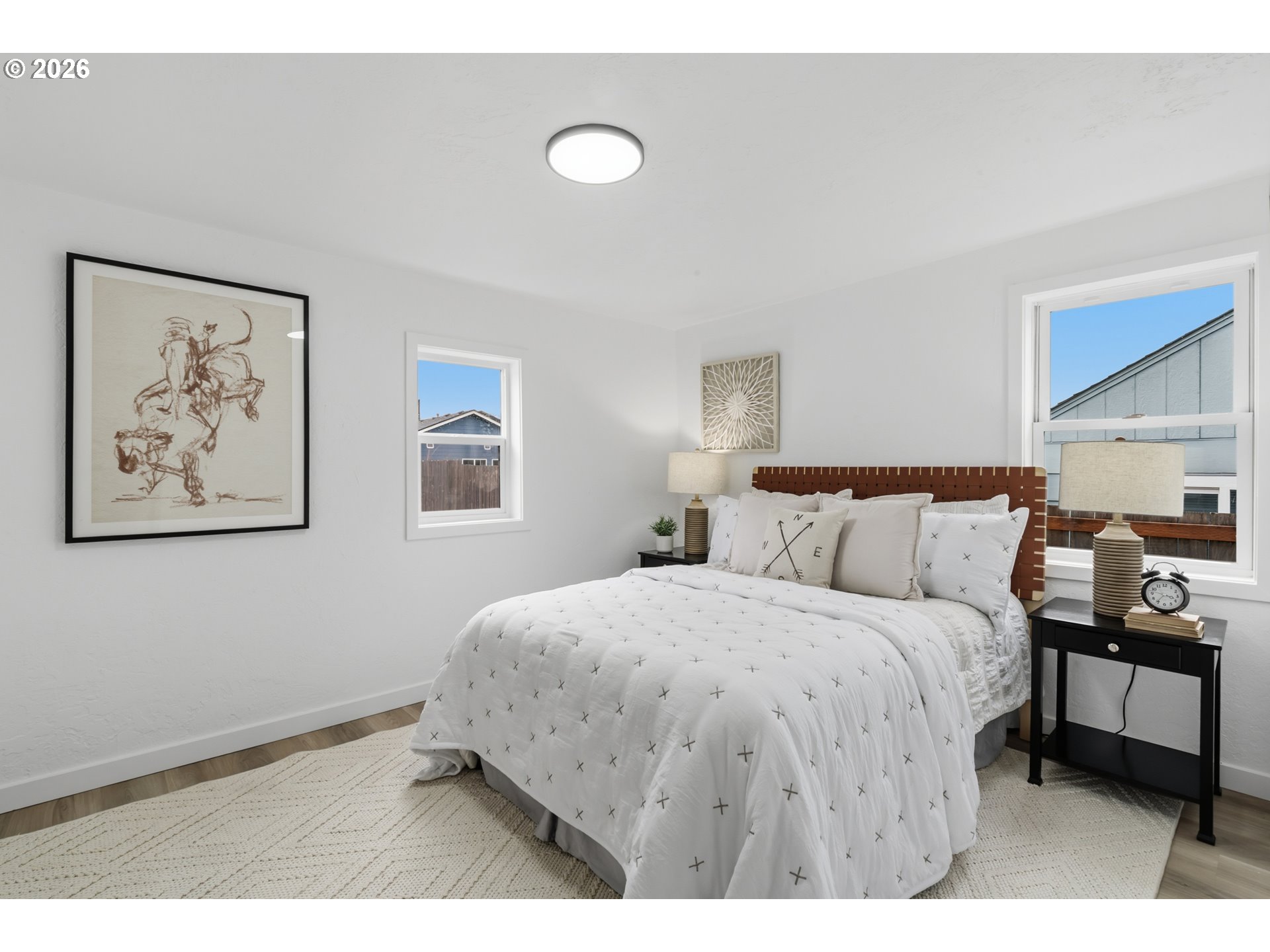 1730 Southwest 12th Avenue Albany, OR 97321 - Photo 9 of 24 a bedroom with a bed and a painting on the wall