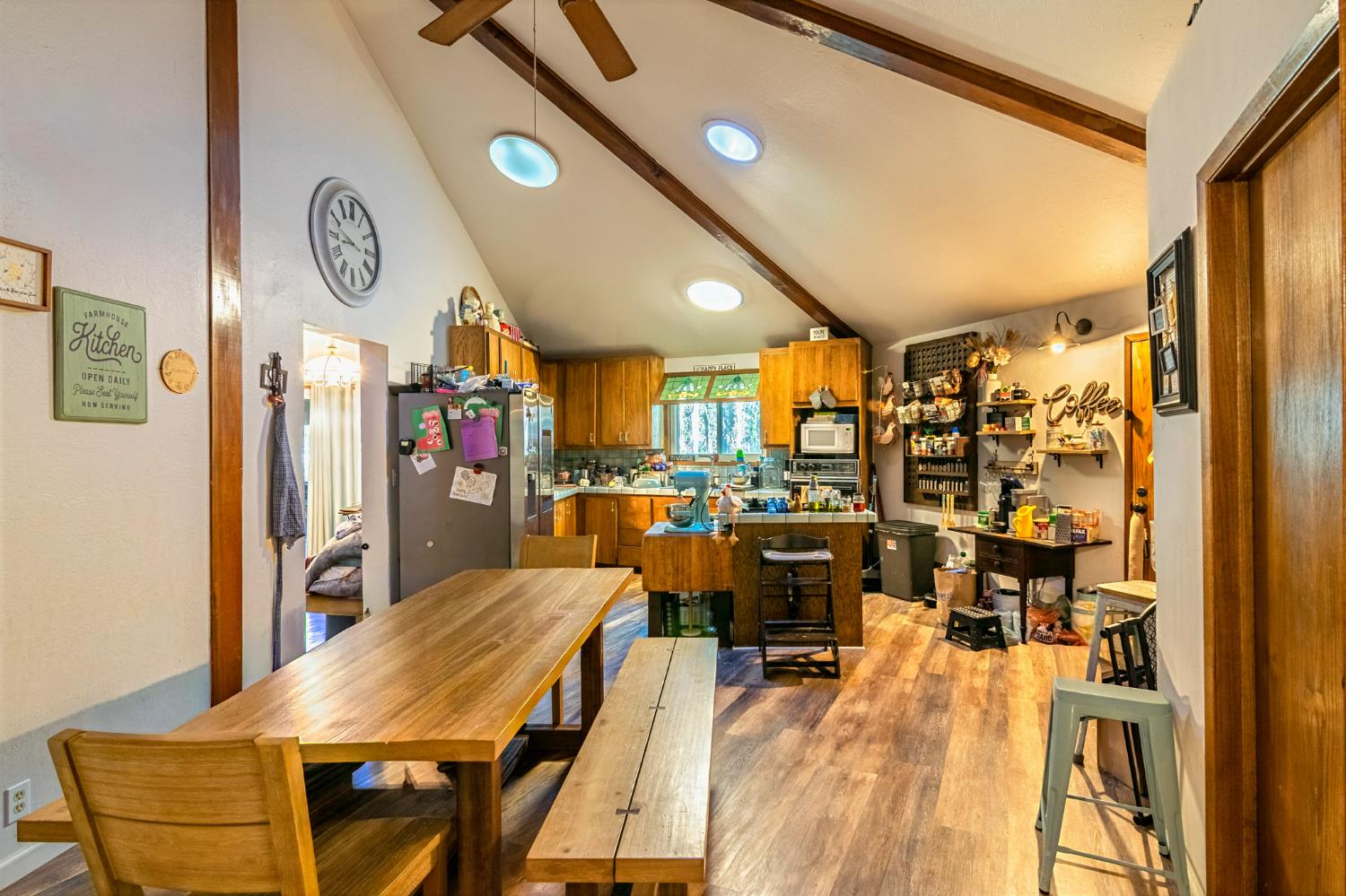 22700 Johnson Valley Road Foresthill, CA 95631 - Photo 13 of 68 a view of a dining area with furniture and a chandelier