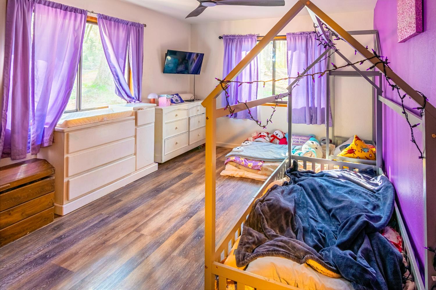 22700 Johnson Valley Road Foresthill, CA 95631 - Photo 22 of 68 a view of a bedroom with furniture and toys