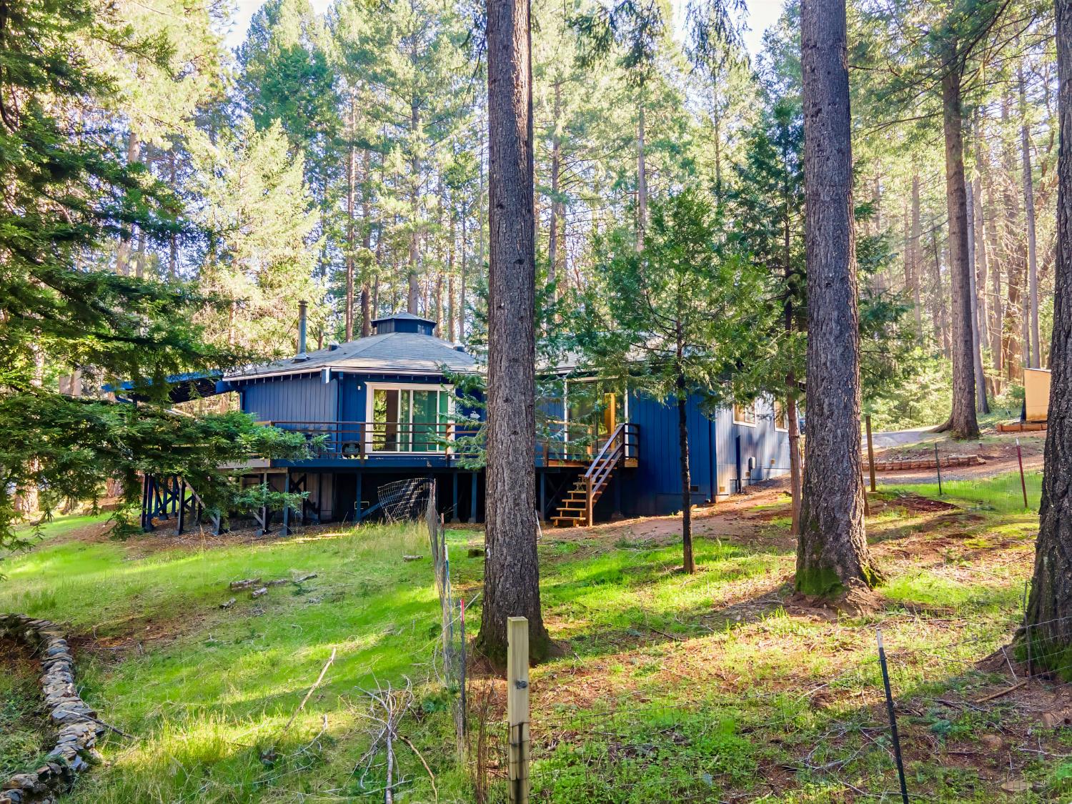 22700 Johnson Valley Road Foresthill, CA 95631 - Photo 38 of 68 a view of a house with backyard and a tree