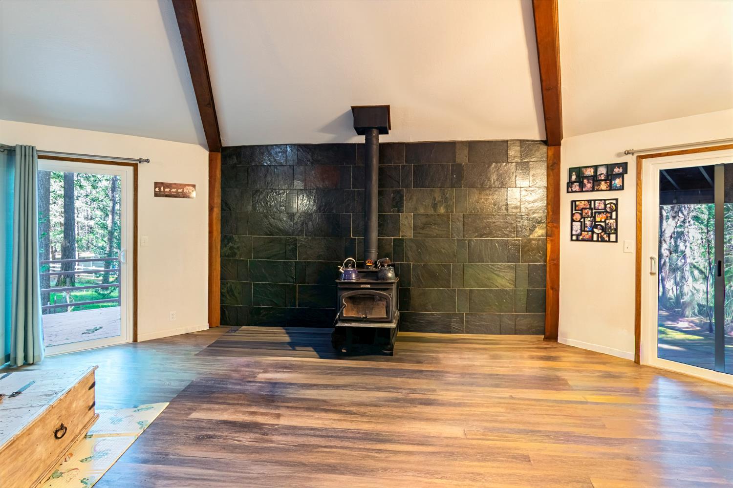 22700 Johnson Valley Road Foresthill, CA 95631 - Photo 9 of 68 a view of a hallway with wooden floor and a bathroom
