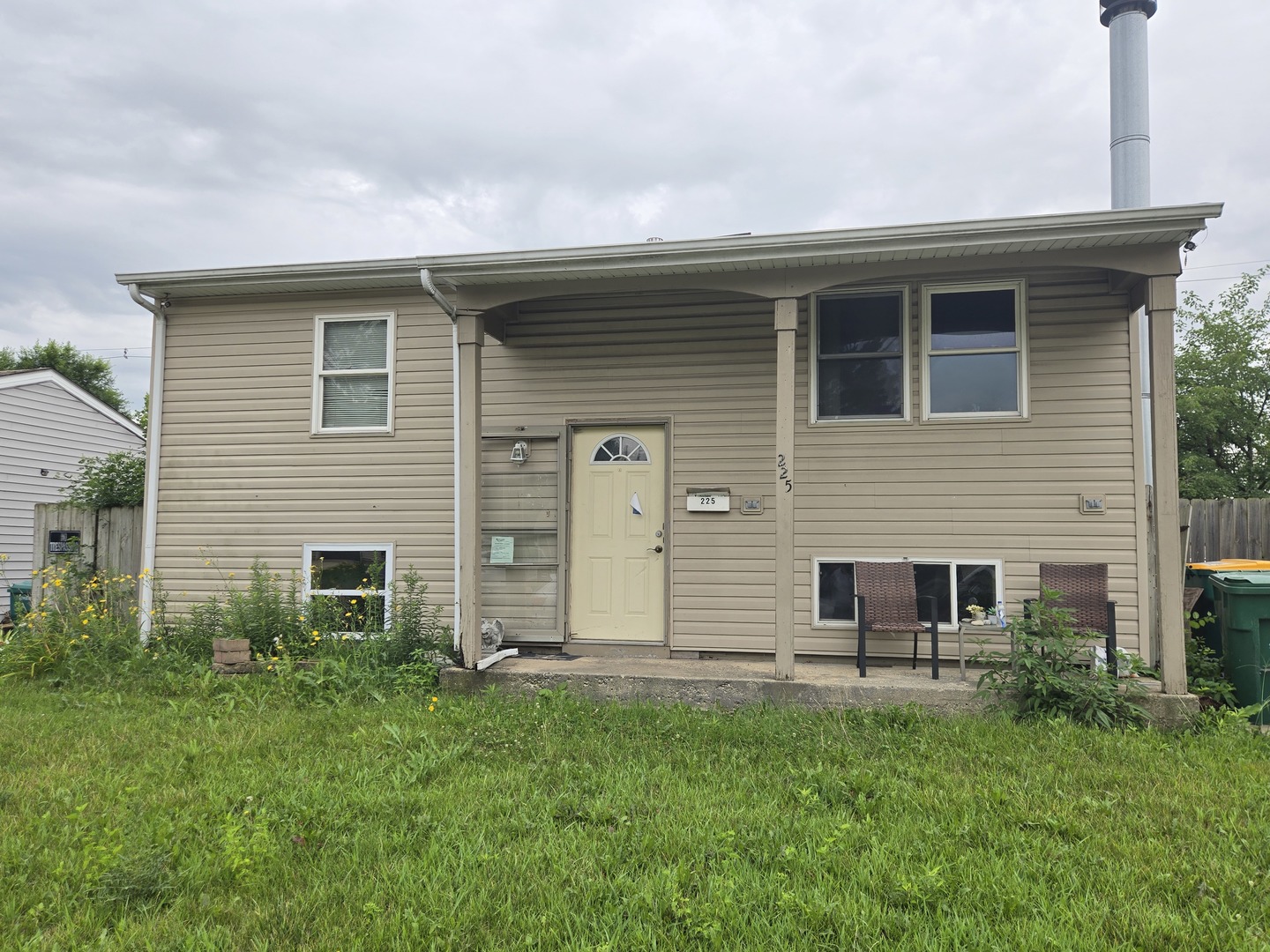 225 Haller Avenue Romeoville, IL 60446 - Photo 1 of 1 a front view of house with yard