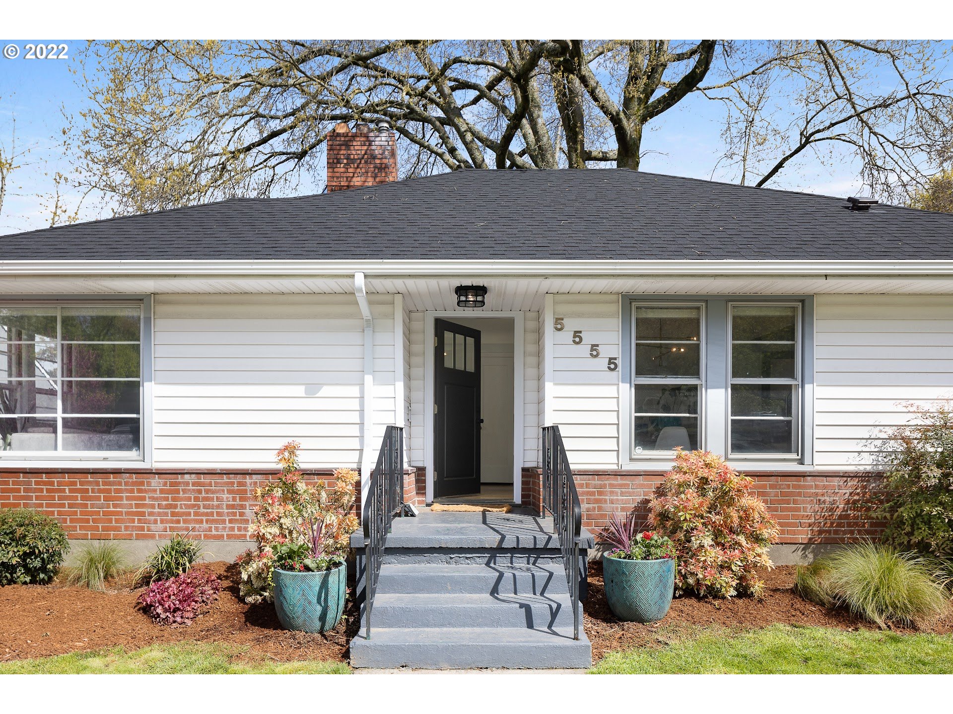 5555 Southeast Stark Street Portland, OR 97215 - Photo 2 of 21 front view of a house