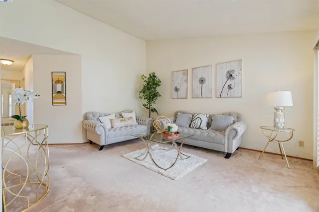 a living room with furniture and a couch