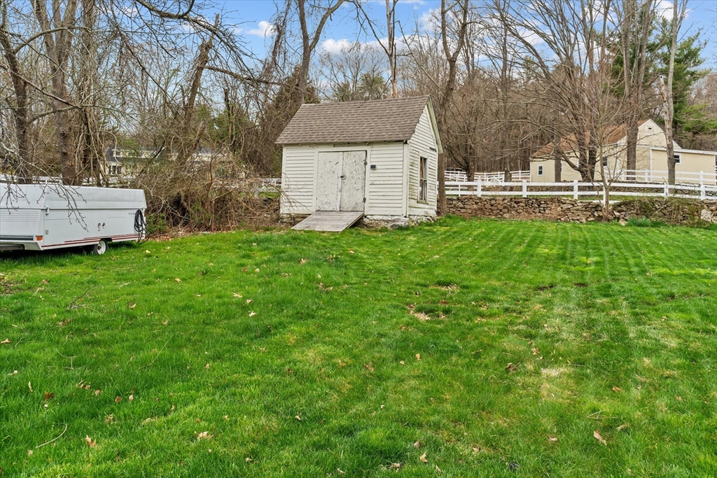 3 Douglas Road Webster, MA 01570 - Photo 20 of 24 a front view of a house with a garden