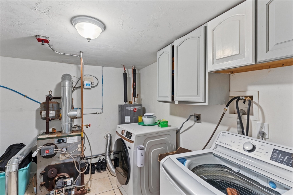 3 Douglas Road Webster, MA 01570 - Photo 24 of 24 a view of a kitchen with appliances and cabinets