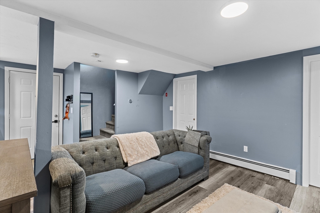 3 Douglas Road Webster, MA 01570 - Photo 6 of 24 a living room with furniture and a rug