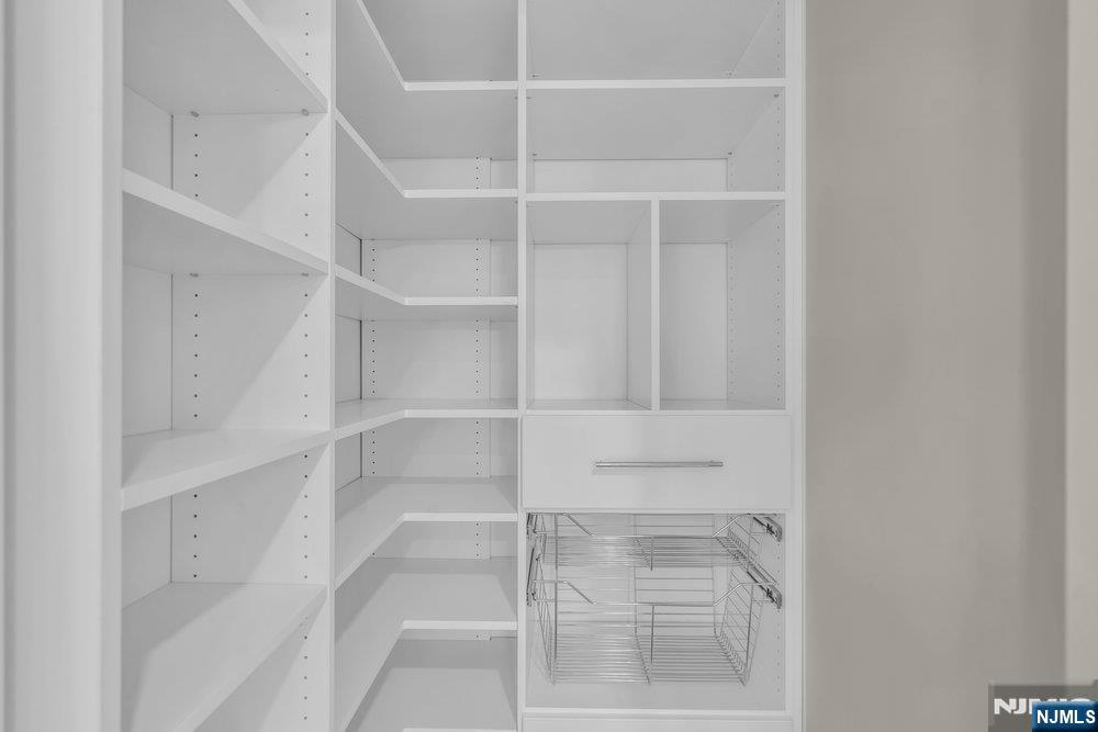 55 Maiden Lane Bergenfield, NJ 07621 - Photo 20 of 49 a view of an empty walk in closet