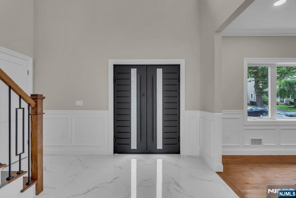 55 Maiden Lane Bergenfield, NJ 07621 - Photo 4 of 49 an entryway with a door