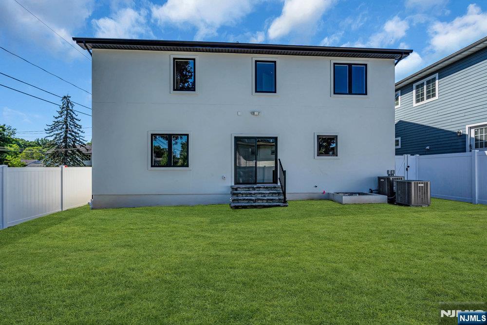 55 Maiden Lane Bergenfield, NJ 07621 - Photo 49 of 49 a house that has a big yard