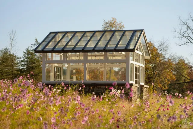 a view of a lake with a yard