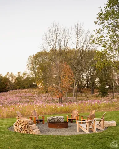 a view of yard covered with snow