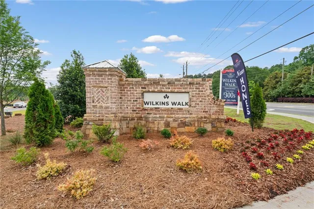 a front view of a house with street view