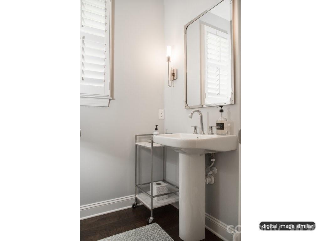 2008 Thatcher Way Fort Mill, SC 29715 - Photo 16 of 27 a bathroom with a sink and a mirror