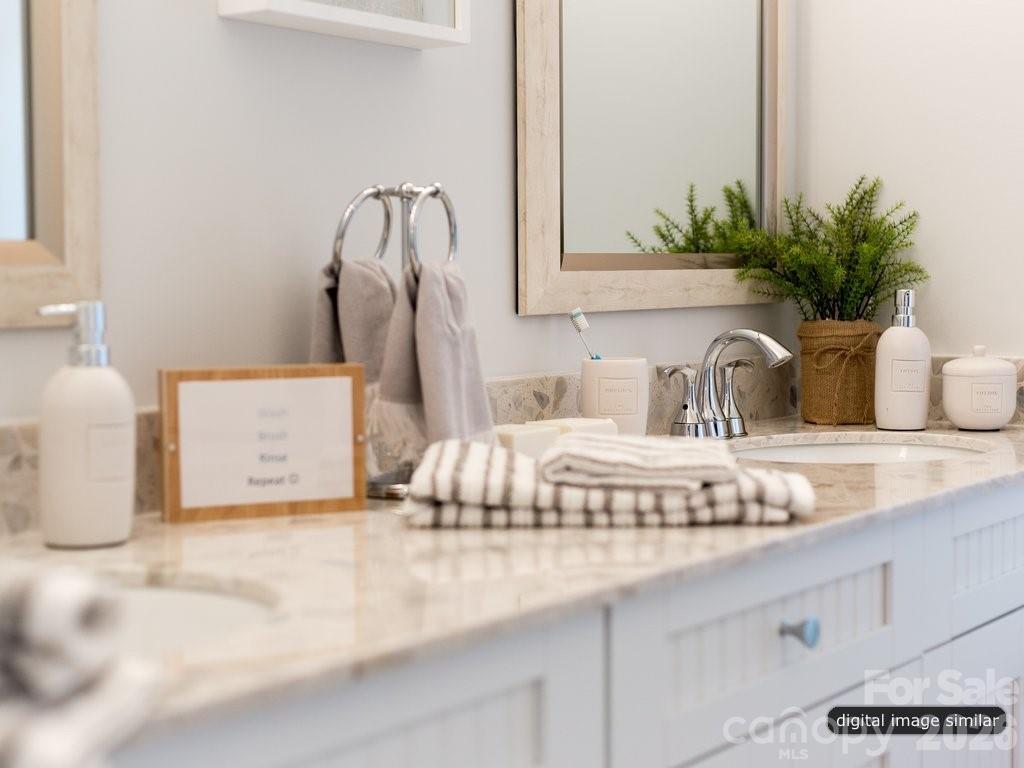 2008 Thatcher Way Fort Mill, SC 29715 - Photo 23 of 27 a bathroom with a sink a potted plant and a window