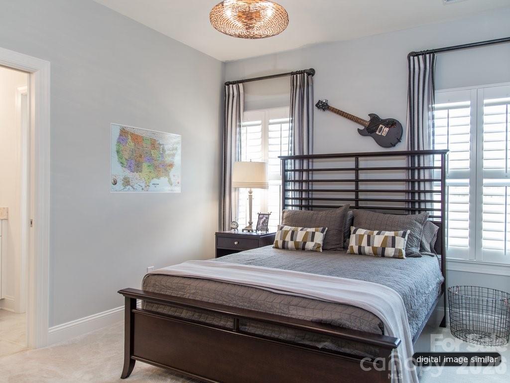 2008 Thatcher Way Fort Mill, SC 29715 - Photo 24 of 27 a bedroom with a bed and a window