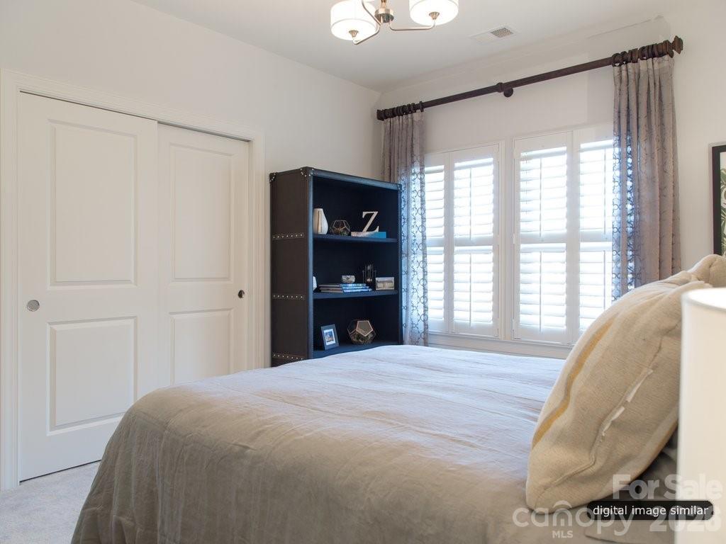 2008 Thatcher Way Fort Mill, SC 29715 - Photo 26 of 27 a bedroom with a bed and a large window