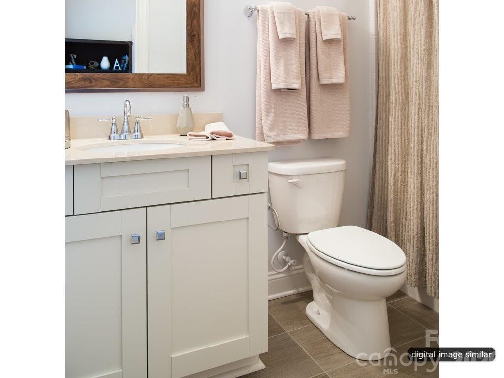2008 Thatcher Way Fort Mill, SC 29715 - Photo 27 of 27 a bathroom with a sink toilet and shower