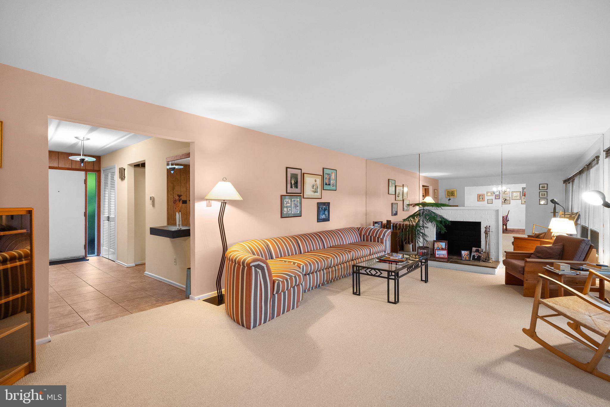 1007 La Grande Road Silver Spring, MD 20903 - Photo 15 of 48 a living room with furniture and a fireplace