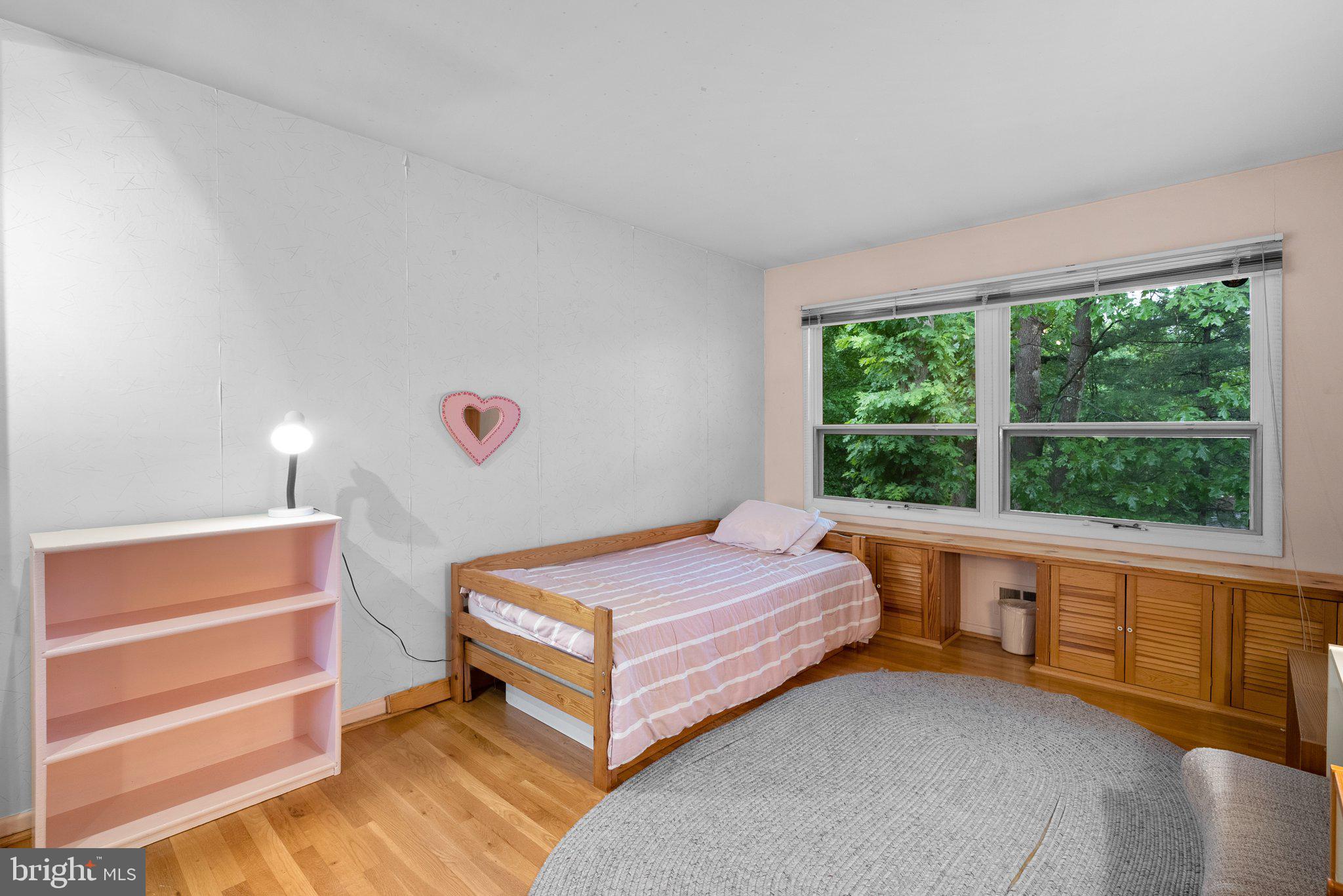 1007 La Grande Road Silver Spring, MD 20903 - Photo 30 of 48 a bedroom with a bed and a window