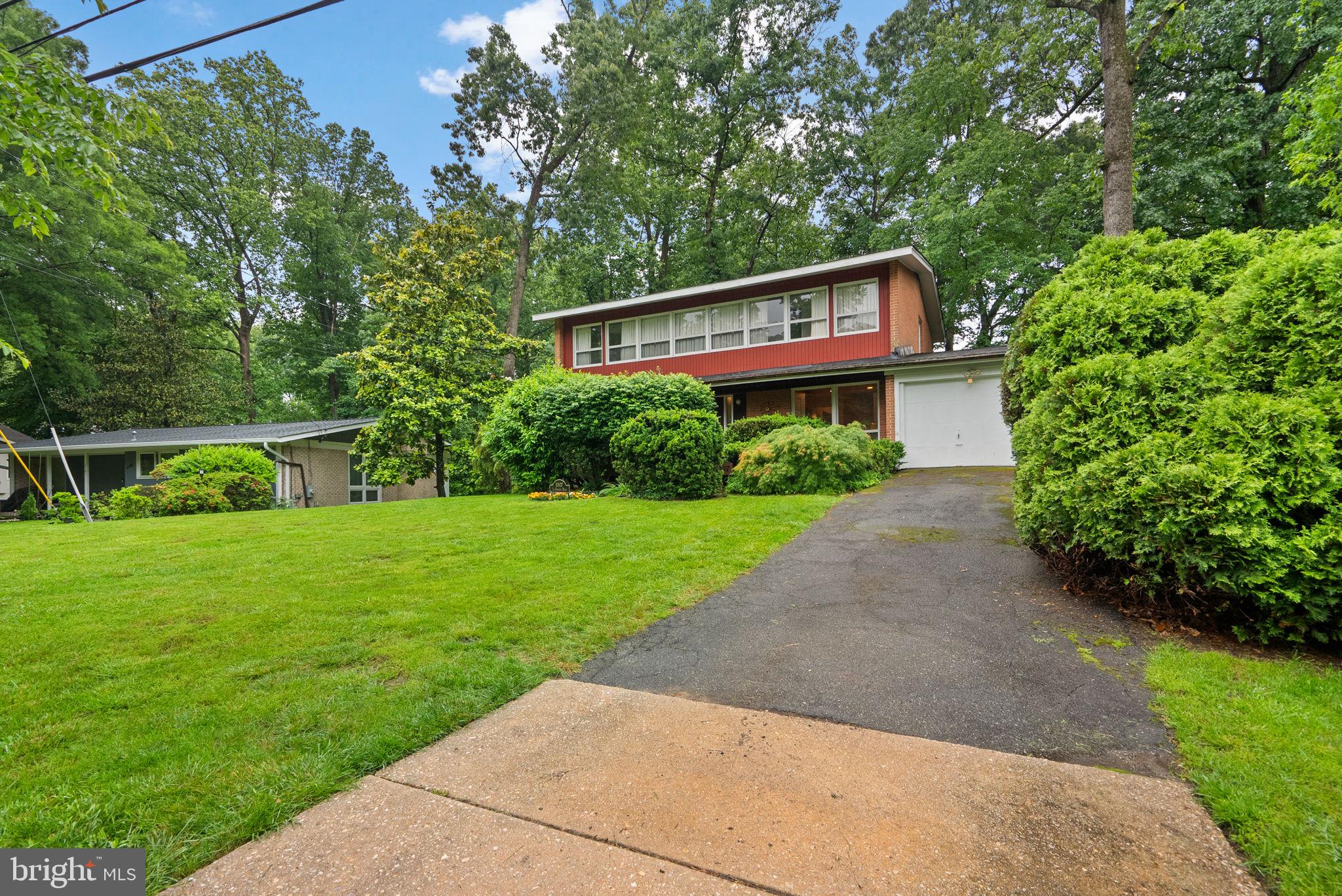 1007 La Grande Road Silver Spring, MD 20903 - Photo 3 of 48 a house view with a garden space