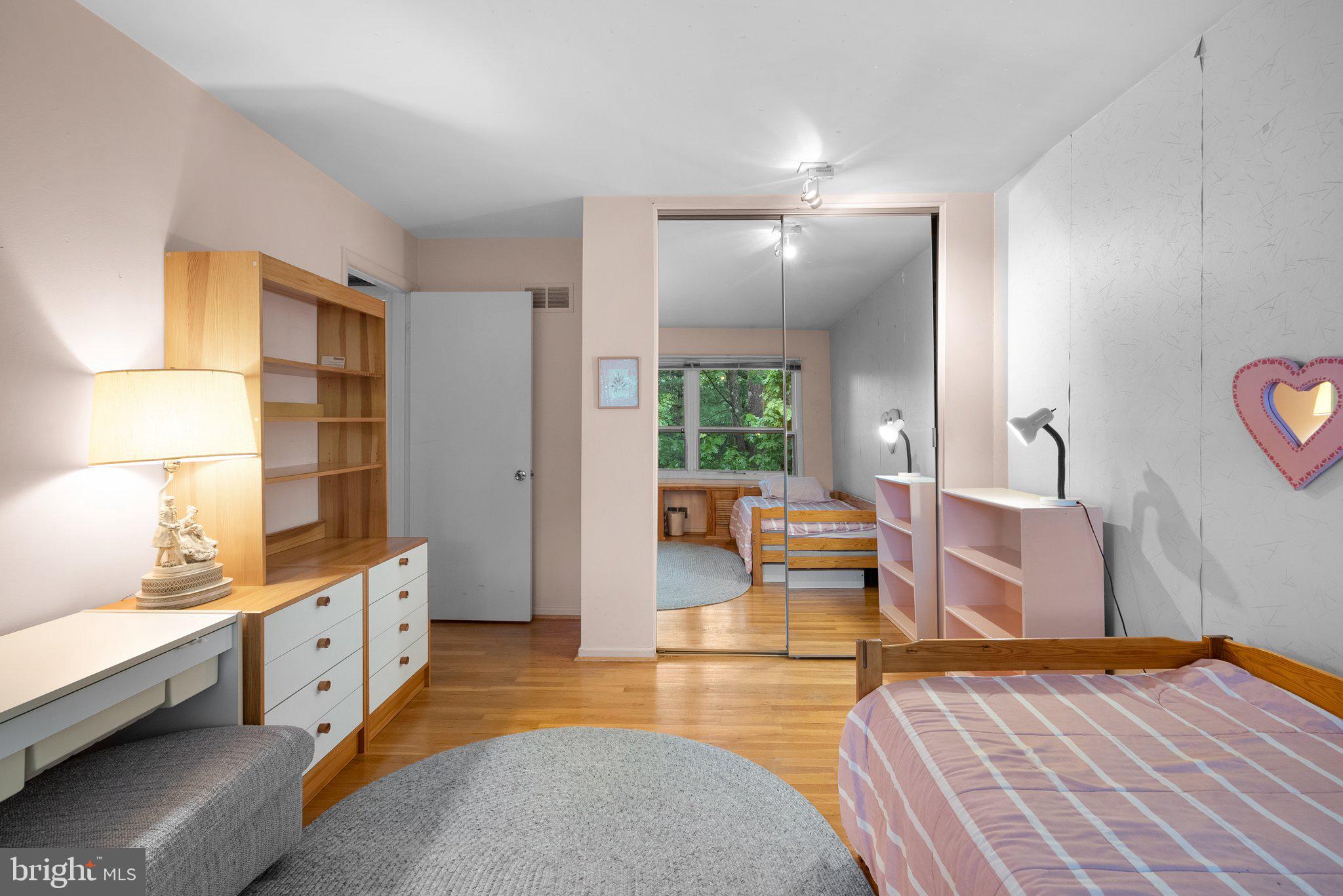 1007 La Grande Road Silver Spring, MD 20903 - Photo 31 of 48 a bedroom with furniture and a lamp