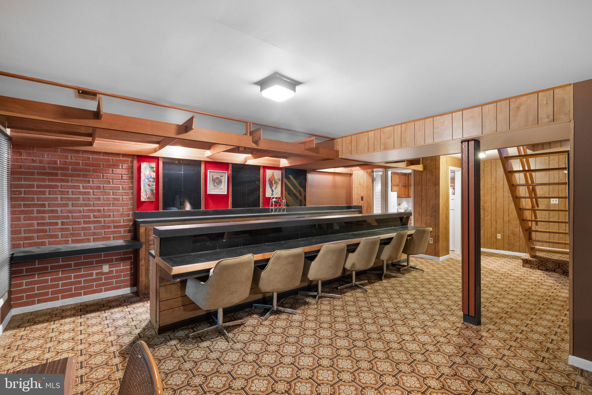 1007 La Grande Road Silver Spring, MD 20903 - Photo 32 of 48 a dining room with furniture and a rug