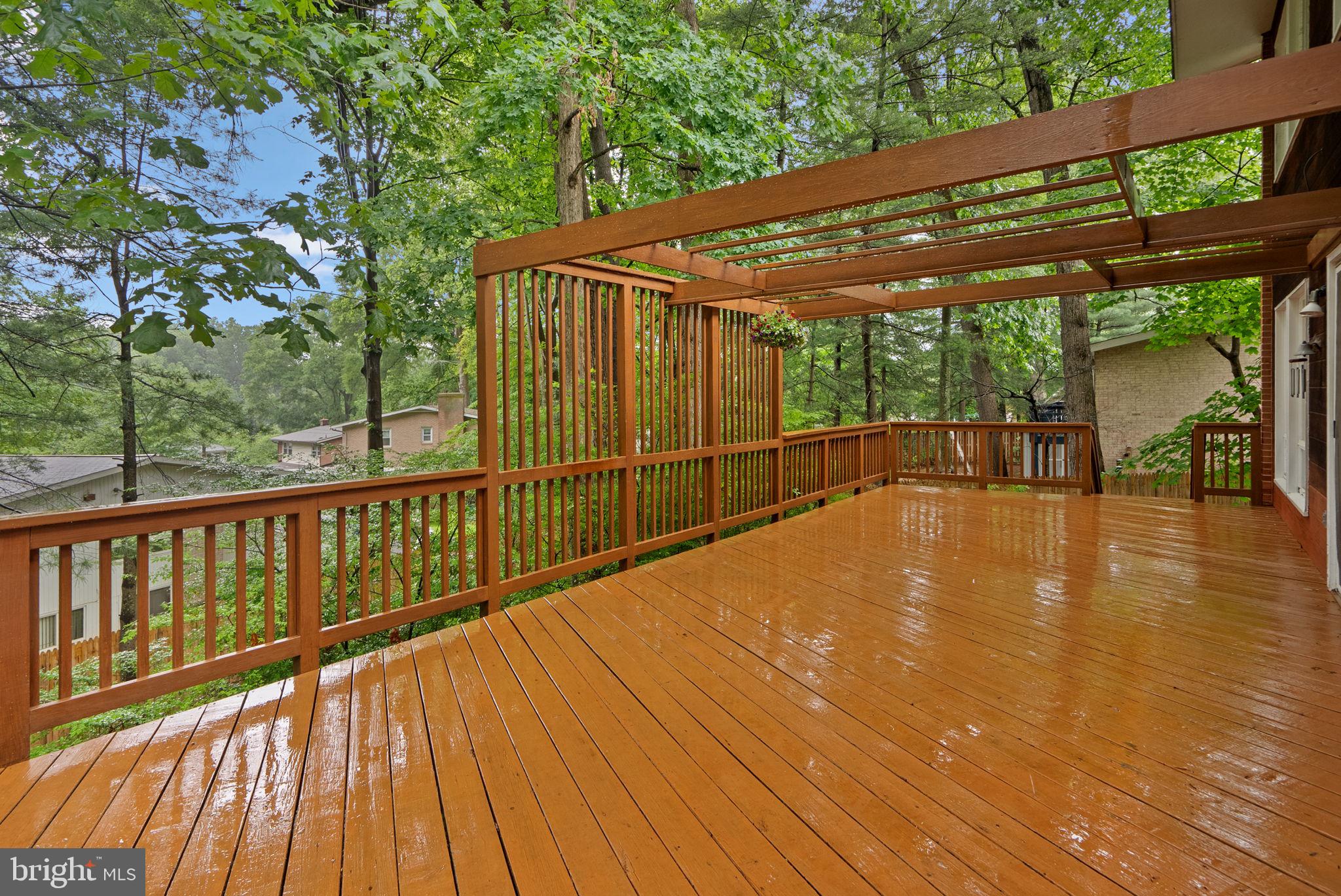 1007 La Grande Road Silver Spring, MD 20903 - Photo 39 of 48 a view of a wooden deck with a yard