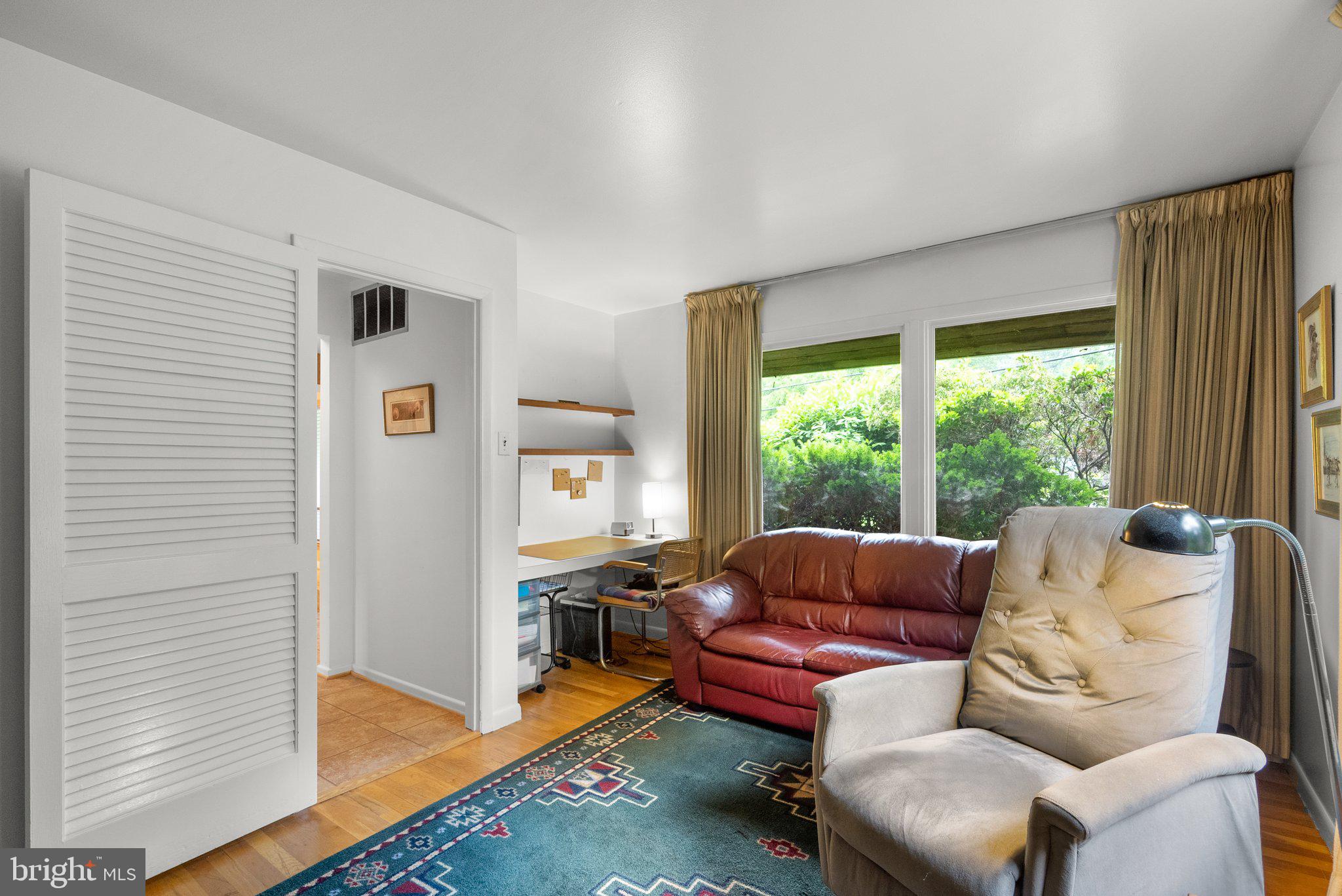 1007 La Grande Road Silver Spring, MD 20903 - Photo 6 of 48 a living room with furniture and a large window