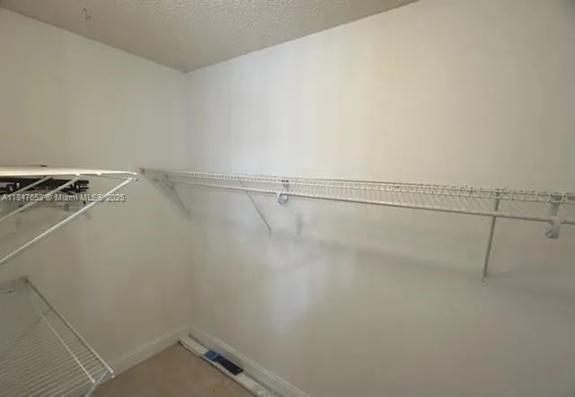 a view of a room with racks on the wall