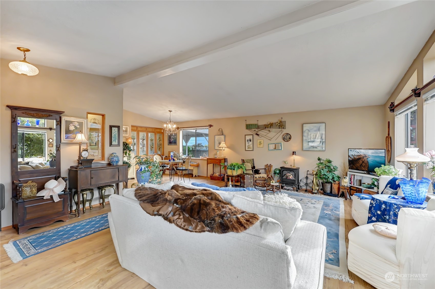 805 236th Place Southwest Bothell, WA 98021 - Photo 5 of 31 a living room with furniture and a large window