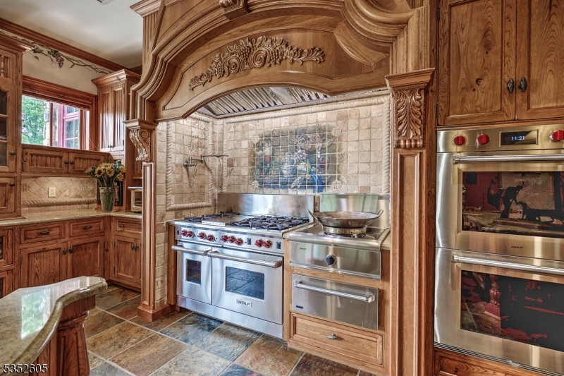 770 Pottersville Road Far Hills, NJ 07931 - Photo 13 of 29 a kitchen with a stove and a refrigerator