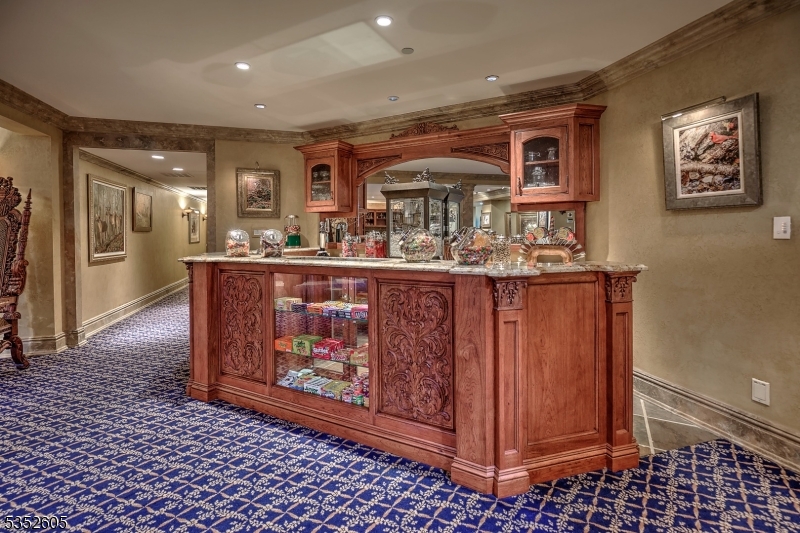 770 Pottersville Road Far Hills, NJ 07931 - Photo 26 of 29 a kitchen with stainless steel appliances granite countertop a stove a sink and a microwave