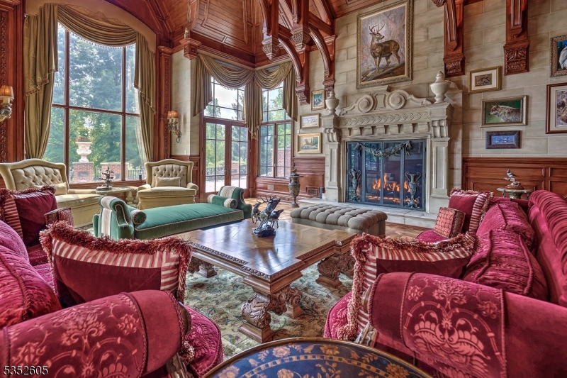 770 Pottersville Road Far Hills, NJ 07931 - Photo 7 of 29 a living room with furniture fireplace and a large window