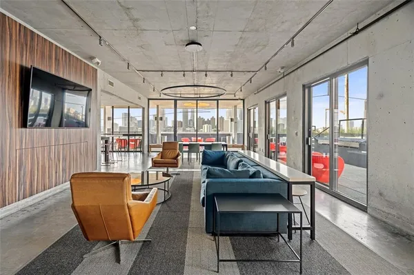 a view of a dining room with furniture window and outside view