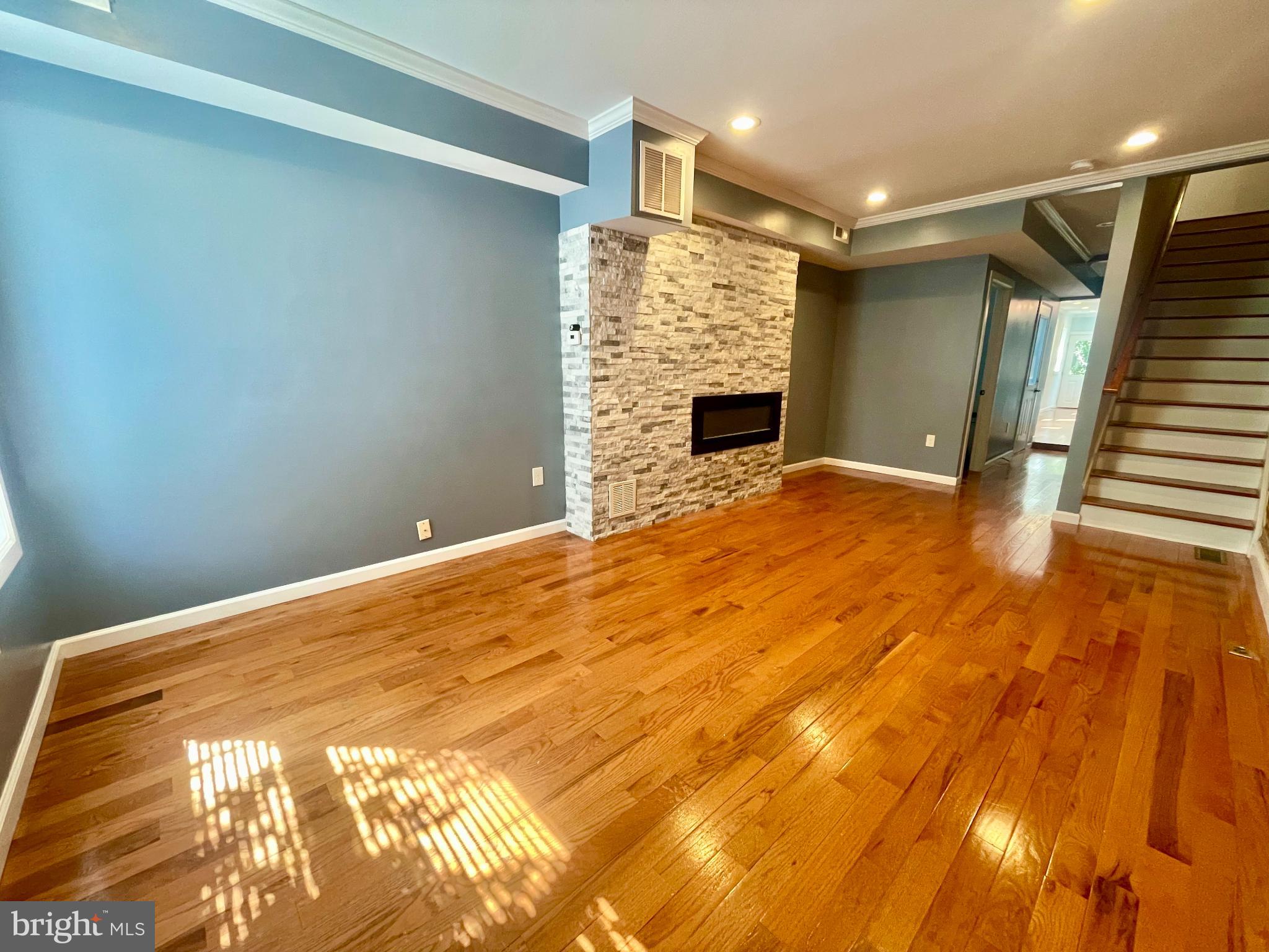 1904 Bank Street Baltimore, MD 21231 - Photo 2 of 20 a view of empty room with wooden floor